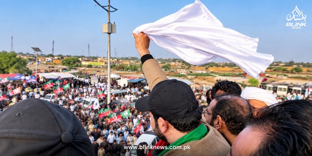 Sohail Afridi waves a white sheet during the Long March